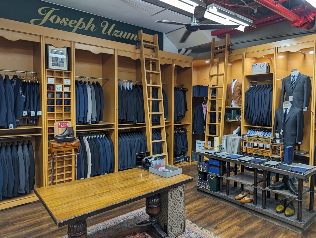 Joseph Uzumcu tailoring library with bespoke suiting and accessories